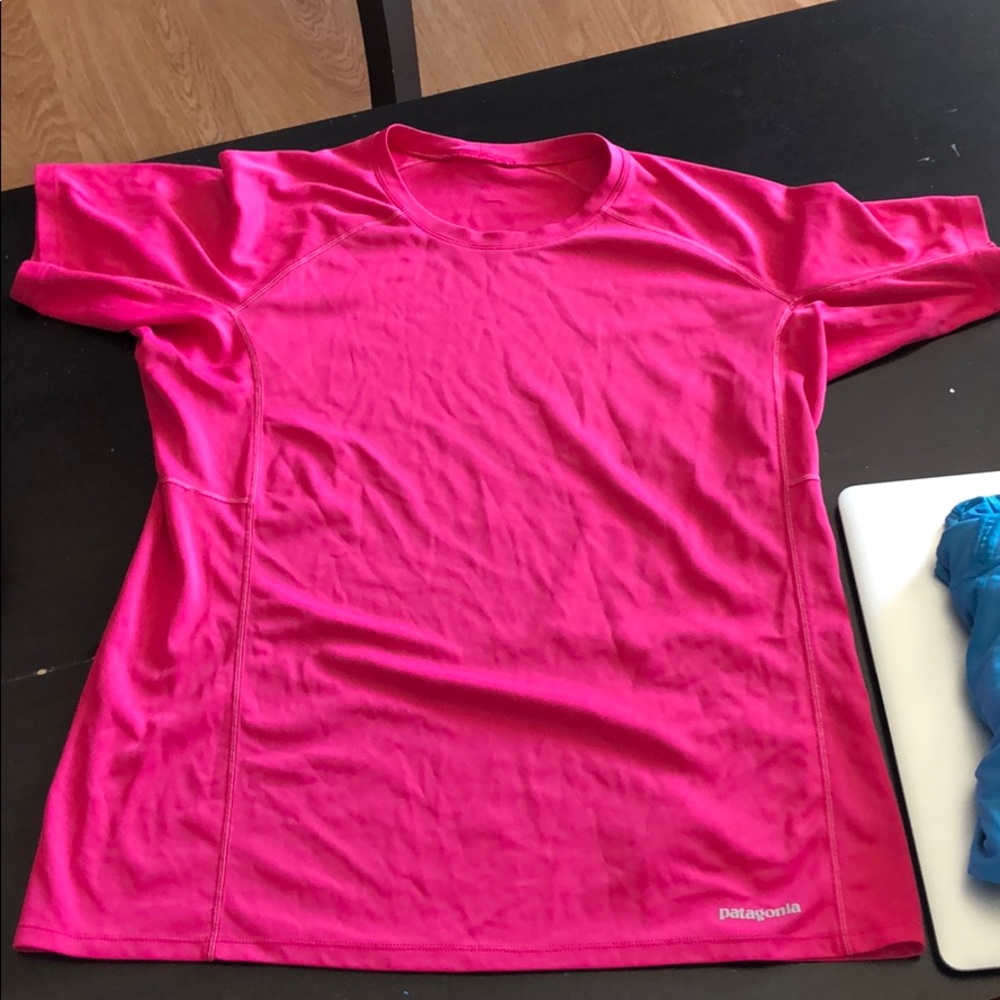 Pink women’s Patagonia running shirt